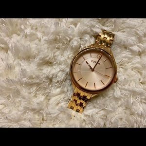 Women’s fossil Rose gold tone watch